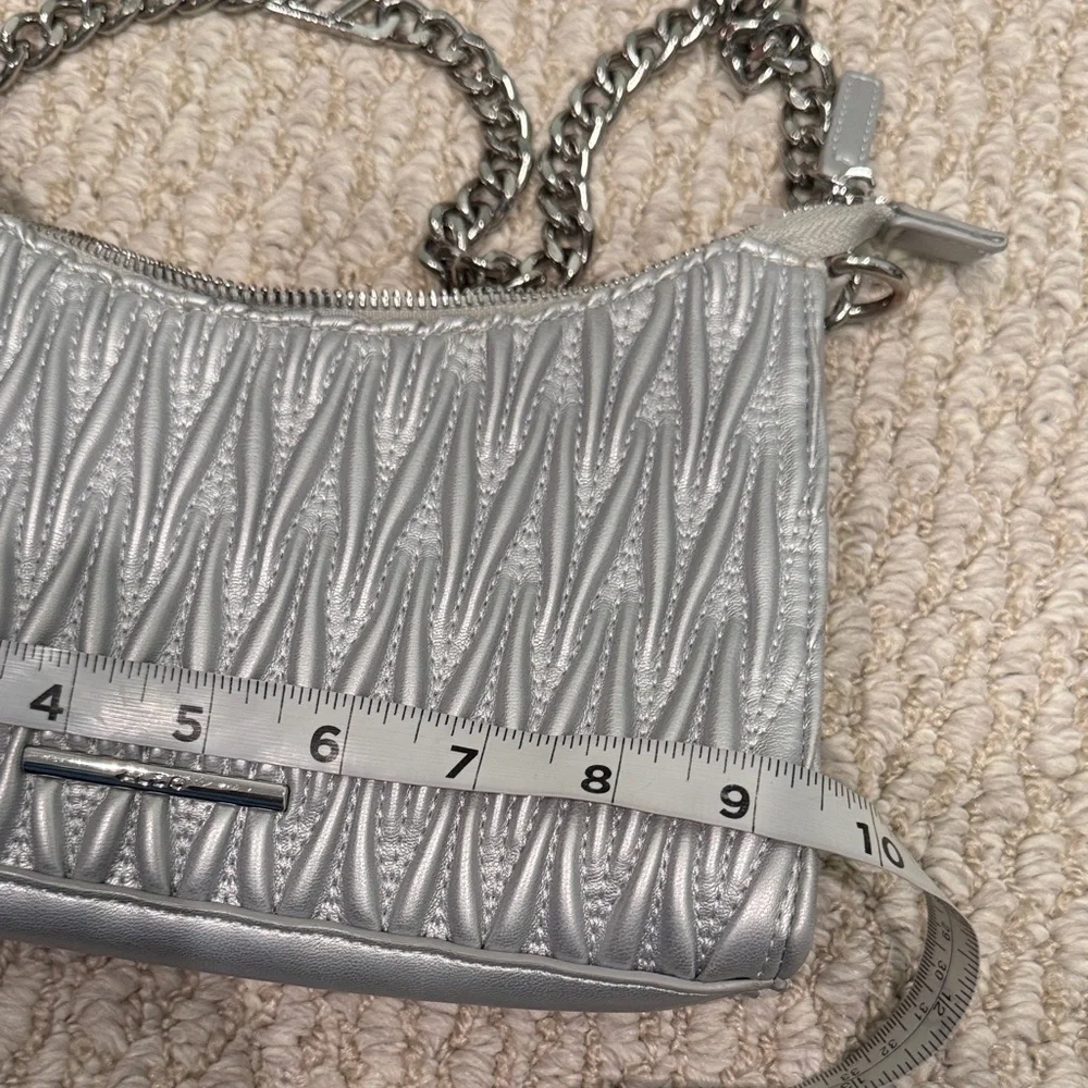 Aldo quilted silver Shoulder Bag with silver chain.